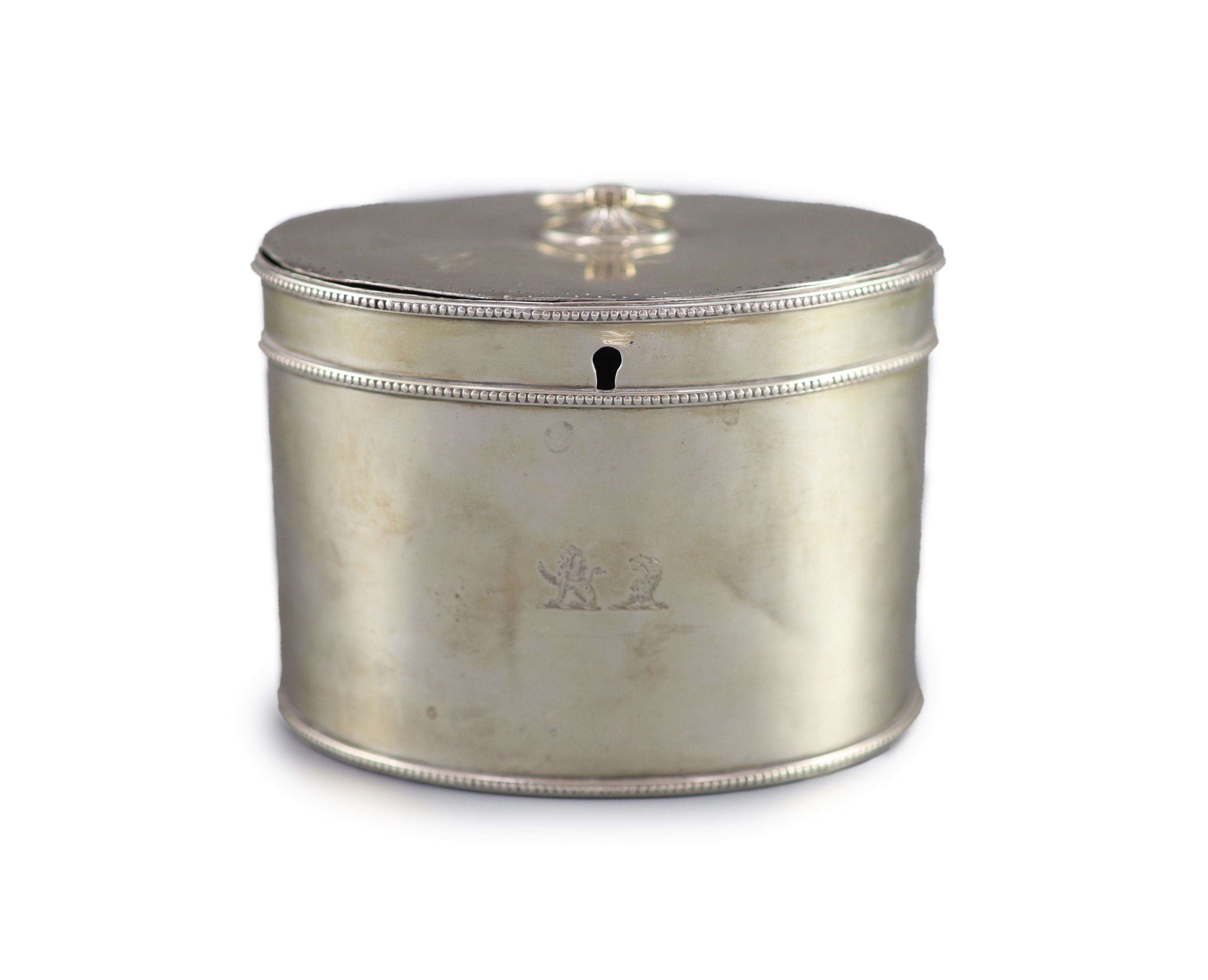A George III silver oval tea caddy by John Younge & Co